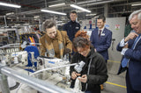 HRH Princess Royal Anne visiting ACS Facility alongside Nigel Lugg pictured watching Employee at work while CEO Andrew Rough and COO Anthony Burns watch on.