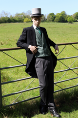 Model wears Black Tailcoat, Green Double Breasted & Grey Stripe Trousers Hire Package