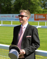 Man wears Black Tailcoat, Pink Waistcoat & Grey Stripe Trousers Hire Package with Top Hat