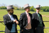 3 men wearing Black Morning Suits from ACS Rental with Assorted waistcoats and accessories