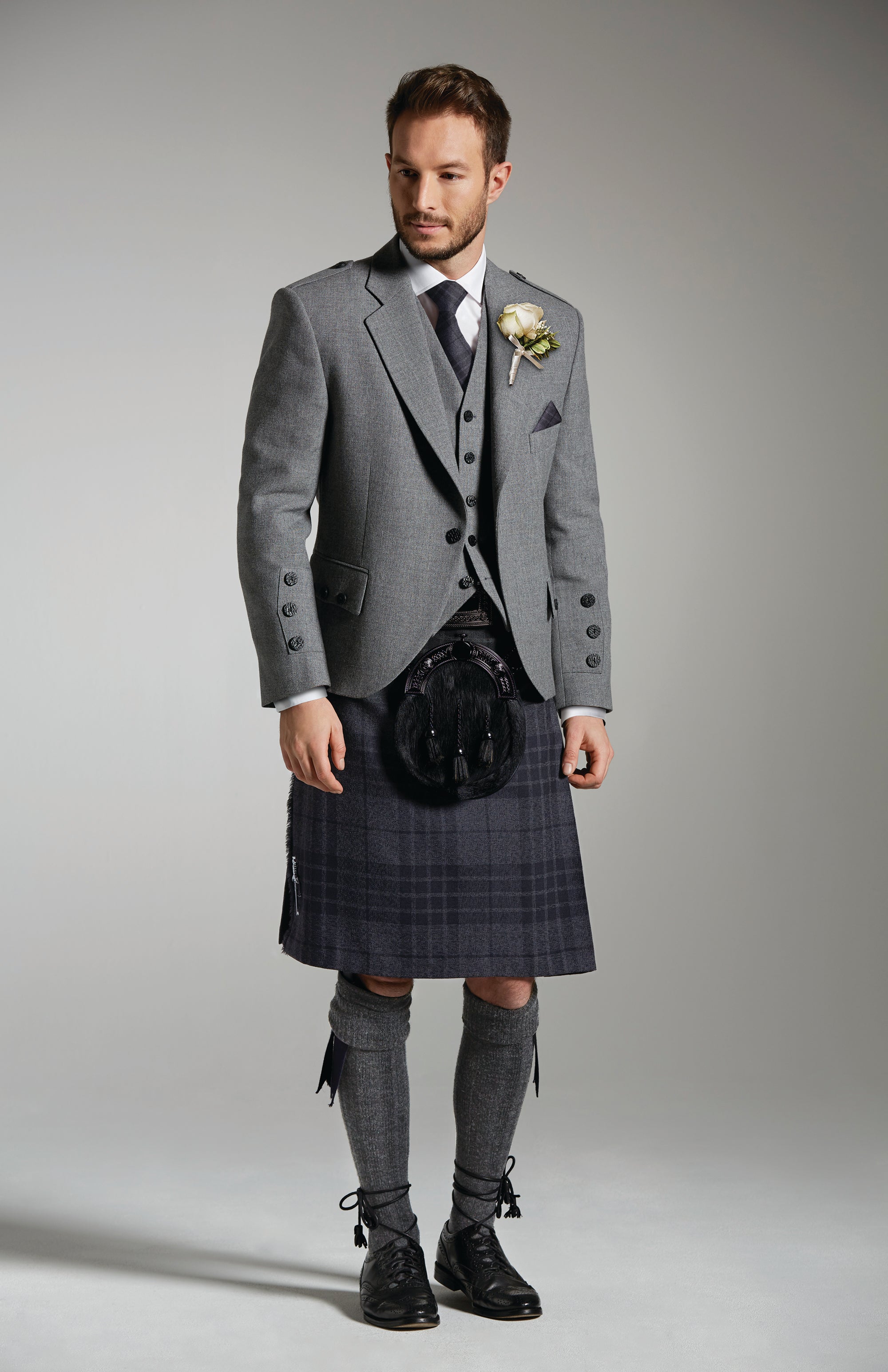 Light Grey Tweed Jacket & Grey Spirit Kilt Hire Package for men. Ideal for weddings, proms, or Highlandwear events. 